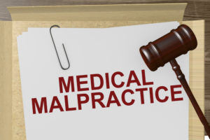 Medical Malpractice Paperwork On Legal Papers